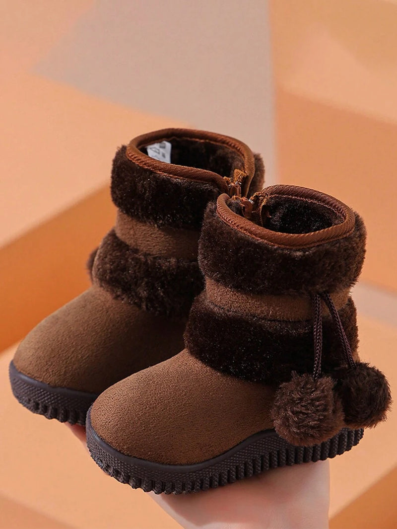 Girls winter snow boots with side zipper and rubber sole

Kids ankle snow boots in coffee brown color

Warm lined children’s snow boots for cold weather