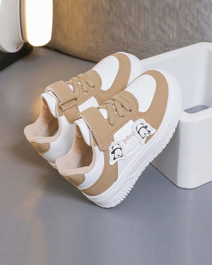 Lightweight kids skate-style sneakers with hook-loop strap

Round-toe PU leather casual sports shoes for boys and girls

Durable anti-slip rubber outsole sneakers for kids