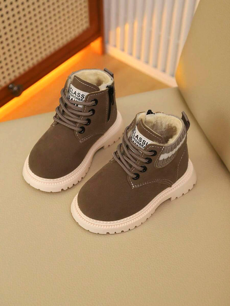 Children’s winter ankle boots with side zipper and lace-up design

Soft sole PU leather kids combat boots for boys and girls

Fashionable grey winter boots for children outdoor wear